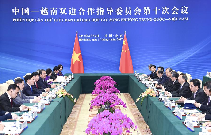 Chinese State Councilor Yang Jiechi and Vietnamese Deputy Prime Minister and Foreign Minister Pham Binh Minh co-chair the 10th meeting of the China-Vietnam steering committee on cooperation in Beijing, capital of China, April 17, 2017. (Xinhua/Zhang Ling)