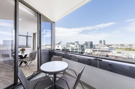  View of Parramatta, NSW Australia skyline from inside Skye Suites Hotel Parramatta, constructed by Sydney-based property developer Crown Group.