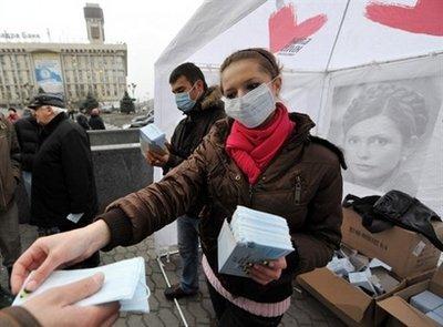 An epidemic of flu and acute respiratory disorders has slowed down in Ukraine, officials said, as the World Health Organization warned of a possible second wave of infections.(AFP/Sergei Supinsky)