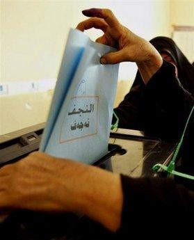 A Shiite woman casts her vote during Iraq's provincial elections in January 2009. Iraq has pushed next year's general election date to March 7th, after an earlier date of March 6th.