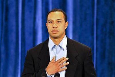 Tiger Woods pauses while delivering a statement to friends and family in Ponte Vedra Beach, Florida, February 19, 2010. REUTERS/Lori Moffett/Pool