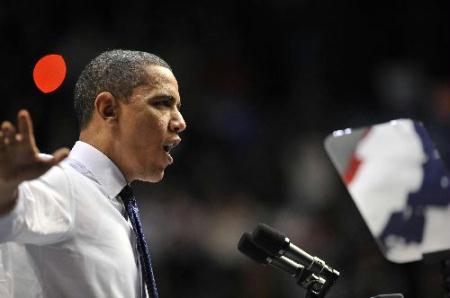 U.S. President Barack Obama attends an event highlighting the health insurance reform at George Mason University in Fairfax, Virginia, about 30 kilometers outside the US capitol Washington D.C., March 19, 2010. (Xinhua/Zhang Jun)