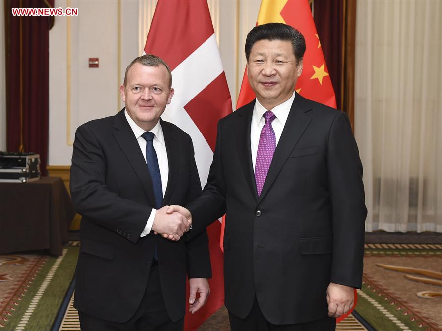 WASHINGTON, March 31, 2016 (Xinhua) -- Chinese President Xi Jinping (R) meets with Danish Prime Minister Lars Loekke Rasmussen in Washington, the United States, March 31, 2016. (Xinhua/Xie Huanchi) 