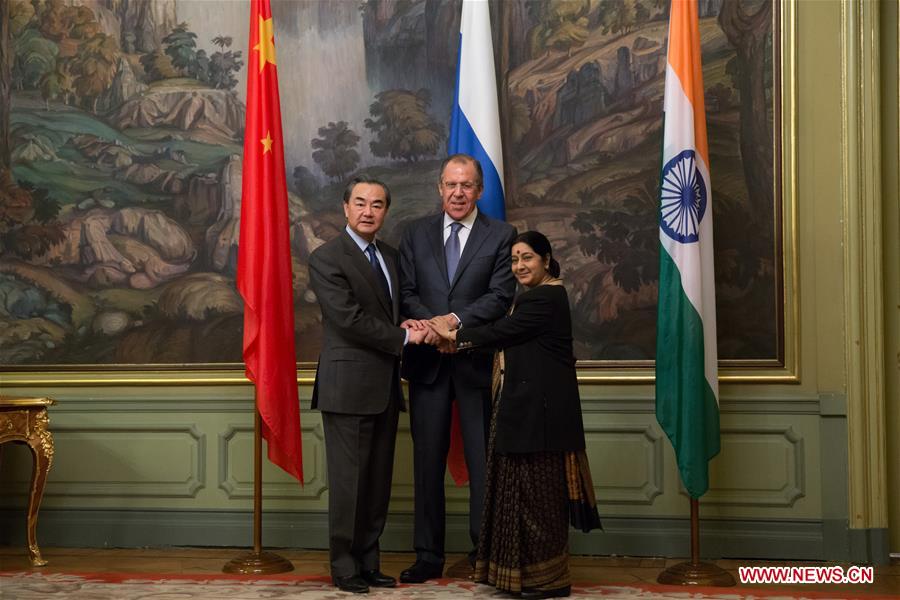 MOSCOW, April 18, 2016 (Xinhua) -- Chinese Foreign Minister Wang Yi (L), Russian Foreign Minister Sergey Lavrov (C) and Indian External Affairs Minister Sushma Swaraj attend the 14th Meeting of the Foreign Ministers of China, Russia and India, in Moscow, capital of Russia, on April 18, 2016. (Xinhua/Bai Xueqi)