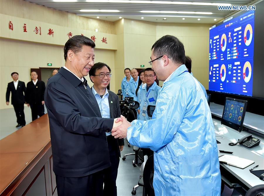 HEFEI, April 27, 2016 (Xinhua) -- Chinese President Xi Jinping visits the Spin Magnetic Resonance Laboratory at University of Science and Technology of China in Hefei, east China