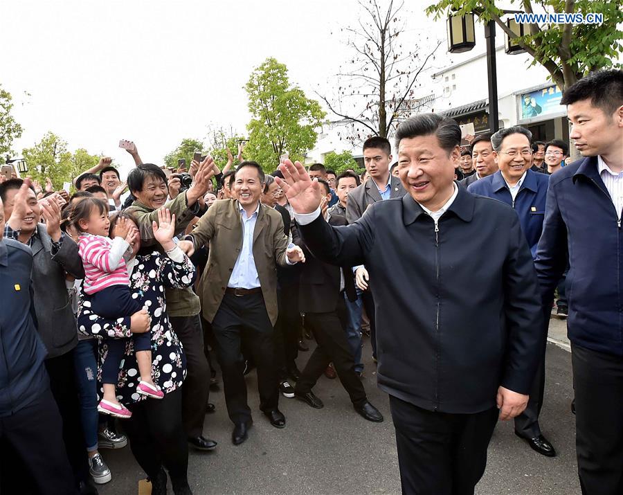 HEFEI, April 27, 2016 (Xinhua) -- Chinese President Xi Jinping greets villagers in Xiaogang Village of Fengyang County, Chuzhou City, east China