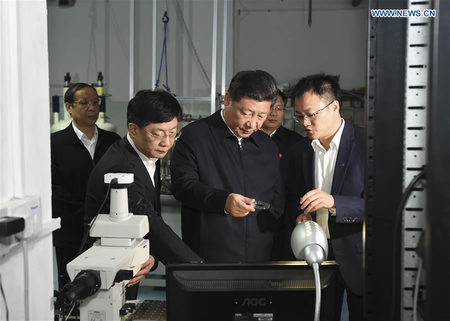 HEFEI, April 27, 2016 (Xinhua) -- Chinese President Xi Jinping visits the Institute of Advanced Technology under University of Science and Technology of China in Hefei, east China