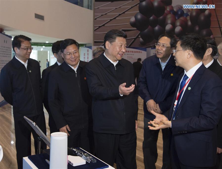 HEFEI, April 27, 2016 (Xinhua) -- Chinese President Xi Jinping visits the Institute of Advanced Technology under University of Science and Technology of China in Hefei, east China