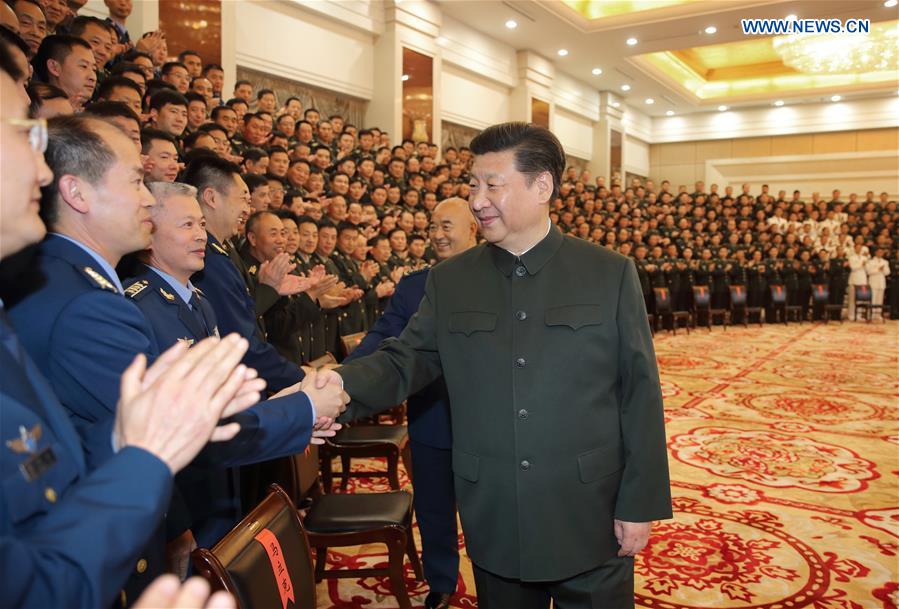 HEFEI, April 27, 2016 (Xinhua) -- Chinese President Xi Jinping shakes hands with senior military officers stationed in Anhui, in Hefei, capital of east China