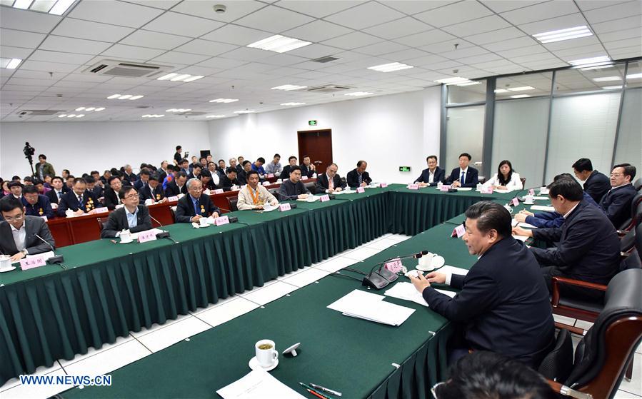 HEFEI, April 29, 2016 (Xinhua) -- Chinese President Xi Jinping(R front) speaks at a meeting with a group of scientists and researchers, model workers and young representatives in Hefei, capital city of east China