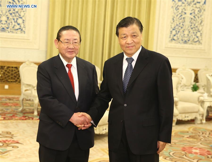 BEIJING, April 29, 2016 (Xinhua) -- Liu Yunshan (R), a member of the Standing Committee of the Political Bureau of the Communist Party of China (CPC) Central Committee, meets with a Japanese delegation led by Taku Yamasaki, former secretary-general of Japan