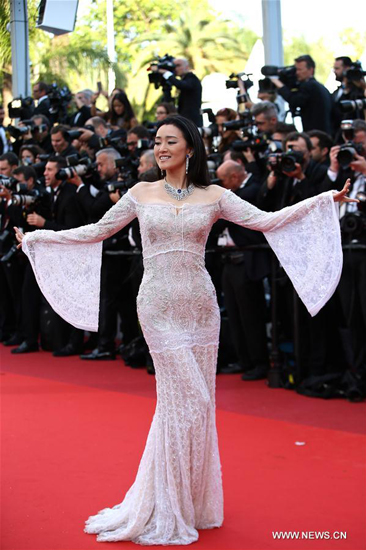 Gong Li on red carpet in Cannes