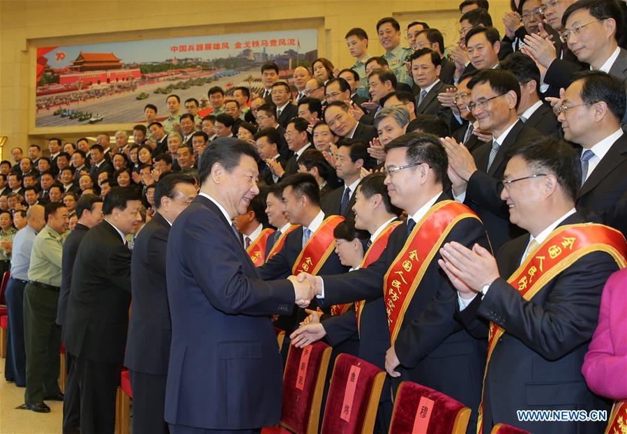 BEIJING, May 13, 2016 (Xinhua) -- Chinese leaders (From R to L 1st Row) Xi Jinping, Li Keqiang, Liu Yunshan, Zhang Gaoli meet with delegates of the 7th national conference on people