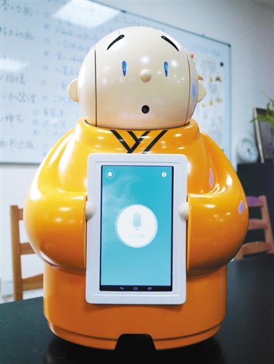 The two-foot-tall robot is able to respond to voice commands, and answer simple questions about the teachings of Buddhism.