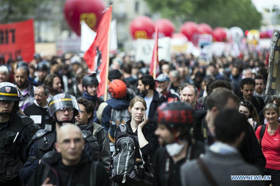 People take to streets to protest against the new labor law in Paris, France on May 17, 2016. In the latest protest against the French government