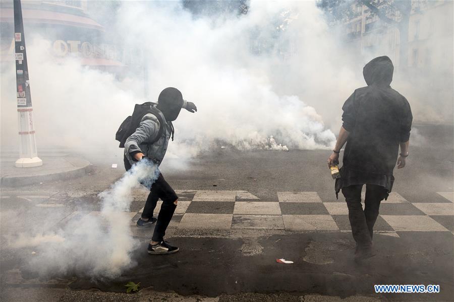 People take to streets to protest against the new labor law in Paris, France on May 17, 2016. In the latest protest against the French government