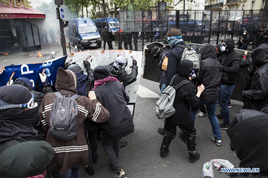 People take to streets to protest against the new labor law in Paris, France on May 17, 2016. In the latest protest against the French government