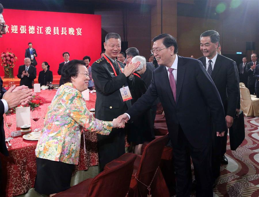 Zhang Dejiang (R front), chairman of the Standing Committee of China