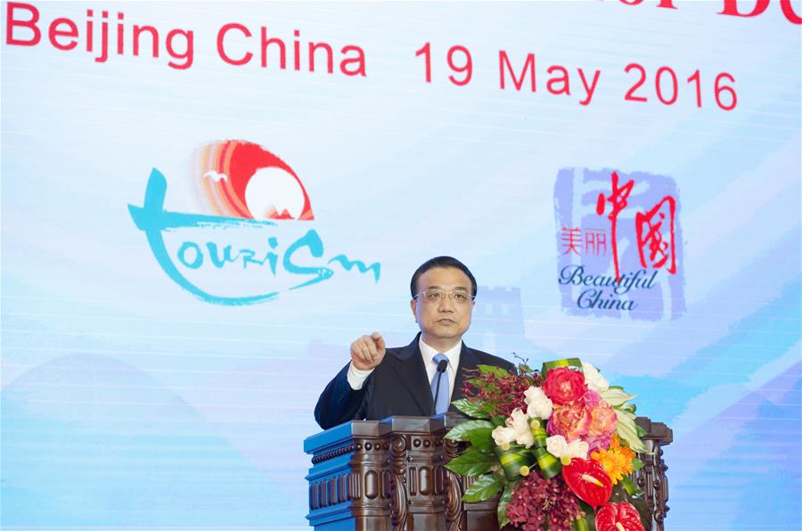 Chinese Premier Li Keqiang delivers a speech at the opening ceremony of the First World Conference on Tourism for Development in Beijing, capital of China, May 19, 2016. (Xinhua/Xie Huanchi)