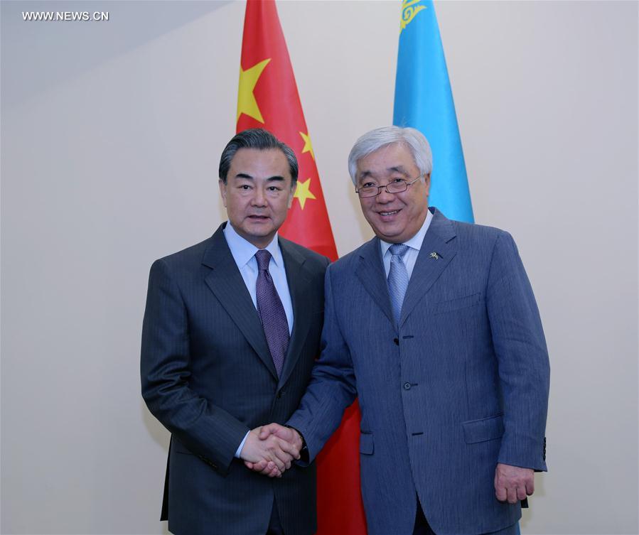 ALMATY, May 21, 2016 (Xinhua) -- Chinese Foreign Minister Wang Yi (L) meets with his Kazakh counterpart Erlan Idrissov in Almaty, Kazakhstan, May 21, 2016. (Xinhua/Zhou Liang)