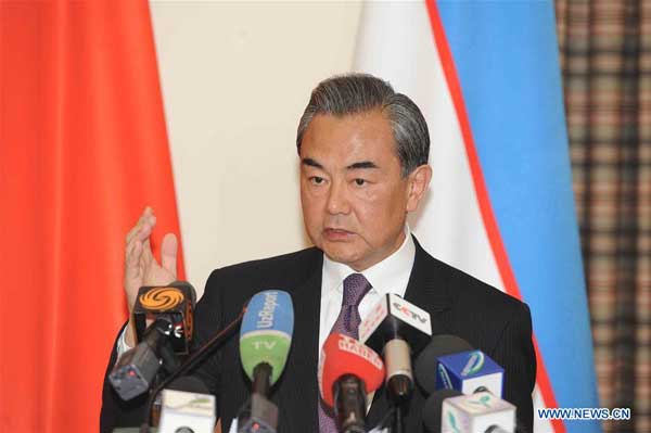 TASHKENT, May 24, 2016 (Xinhua) -- Chinese Foreign Minister Wang Yi addresses reporters after attending a meeting of the Shanghai Cooperation Organization (SCO) foreign ministers in the capital of Uzbekistan on May 24, 2016. The Shanghai Cooperation Organization (SCO) has become a paradigm of global and regional cooperation with great vitality and significant influence since its founding 15 years ago, visiting Chinese Foreign Minister Wang Yi said here Tuesday. (Xinhua/Sadat)