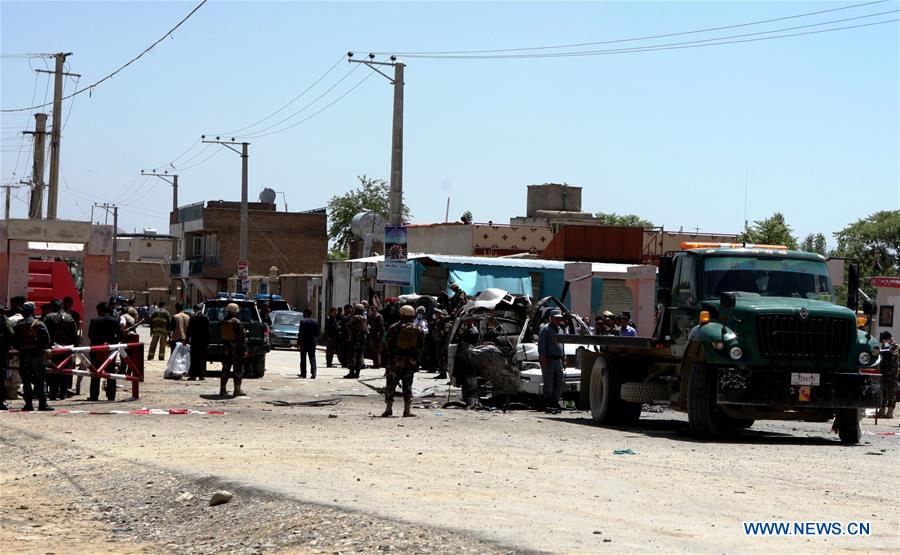 Afghan security force members inspect the site of a suicide bombing in Kabul, capital of Afghanistan, May 25, 2016. At least 10 people were killed and four others wounded after a suicide bomber struck a bus carrying a local court employees in Afghan capital of Kabul on Wednesday, police said. (Xinhua/Omid) 