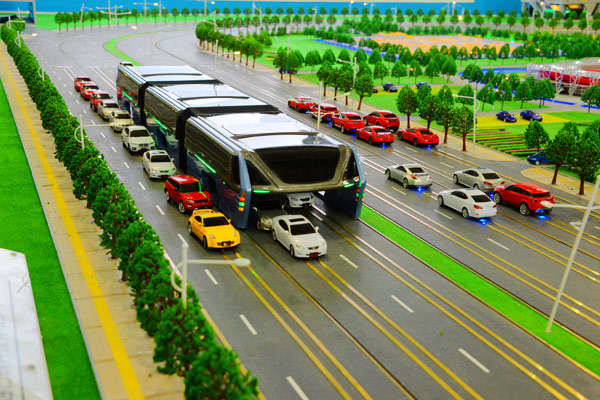 A model of the Transit Elevated Bus is displayed at the Beijing International High-tech Expo on May 20. 