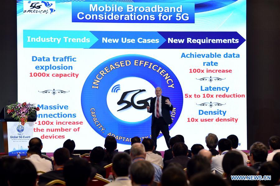 President of 5G Americas Chris Pearson gives a speech during the first Global 5G Event in Beijing, capital of China, May 31, 2016. The theme of the two-day event is "building 5G technology ecosystem". (Xinhua/Li Xin)