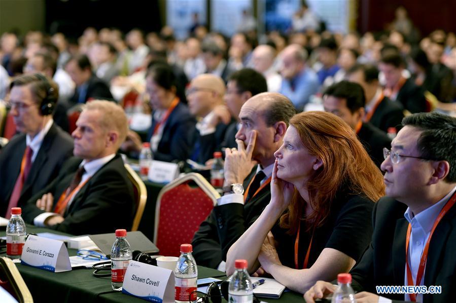 Participants listen to a speech during the first Global 5G Event in Beijing, capital of China, May 31, 2016. The theme of the two-day event is "building 5G technology ecosystem". (Xinhua/Li Xin)