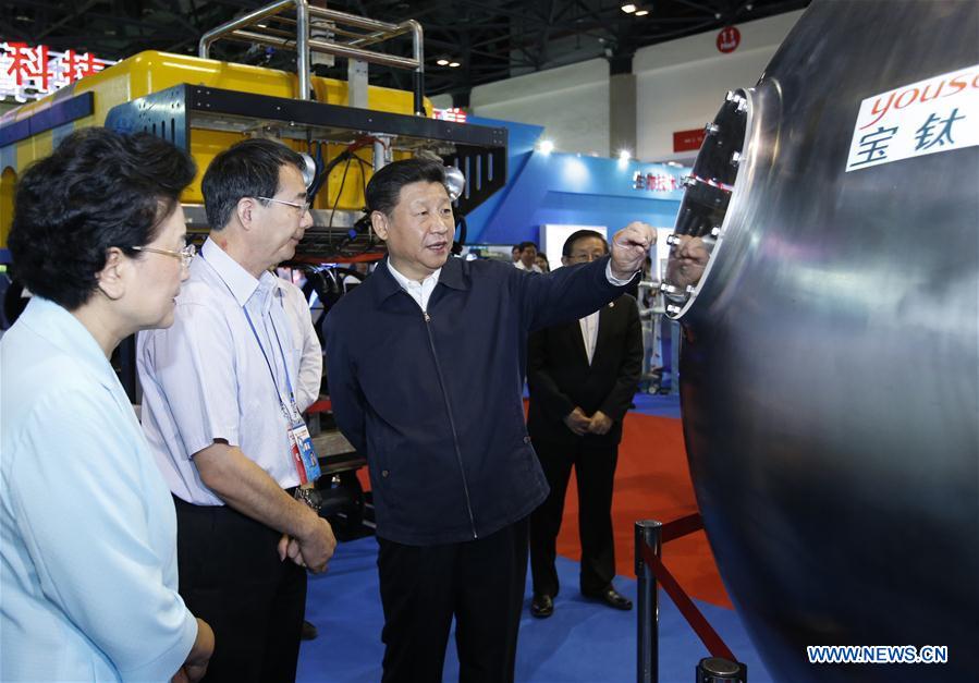 BEIJING, June 3, 2016 (Xinhua) -- Chinese PresidentXi Jinping(3rd L) visits an exhibition on China