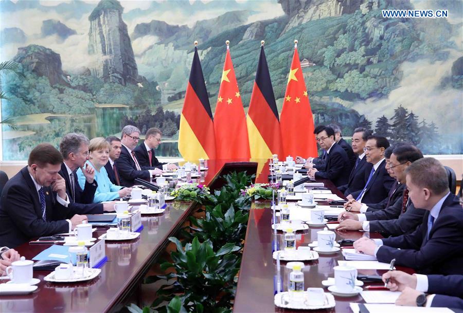 BEIJING, June 13, 2016 (Xinhua) -- Chinese Premier Li Keqiang (4th R) holds talks with German Chancellor Angela Merkel (3rd L) at the Great Hall of the People in Beijing, capital of China, June 13, 2016. (Xinhua/Liu Weibing) 