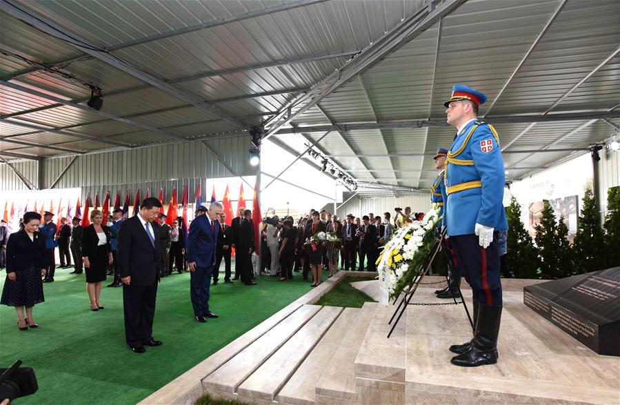BELGRADE, June 17, 2016 (Xinhua) -- Chinese President Xi Jinping and his wife Peng Liyuan pay homage to the Chinese martyrs killed in the NATO bombing of the former Chinese embassy in the Federal Republic of Yugoslavia in May 1999, after arriving in Belgrade for a state visit to Serbia, June 17, 2016. The three martyrs were journalists Shao Yunhuan of Xinhua News Agency, and Xu Xinghu and his wife Zhu Ying, of the Guangming Daily newspaper. (Xinhua/Rao Aimin)
