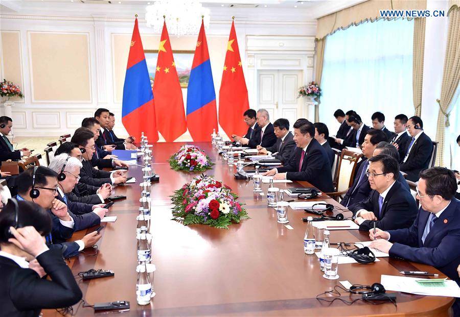  Chinese President Xi Jinping meets with Mongolian President Tsakhiagiin Elbegdorj in Tashkent, Uzbekistan, June 23, 2016. (Xinhua/Li Tao)