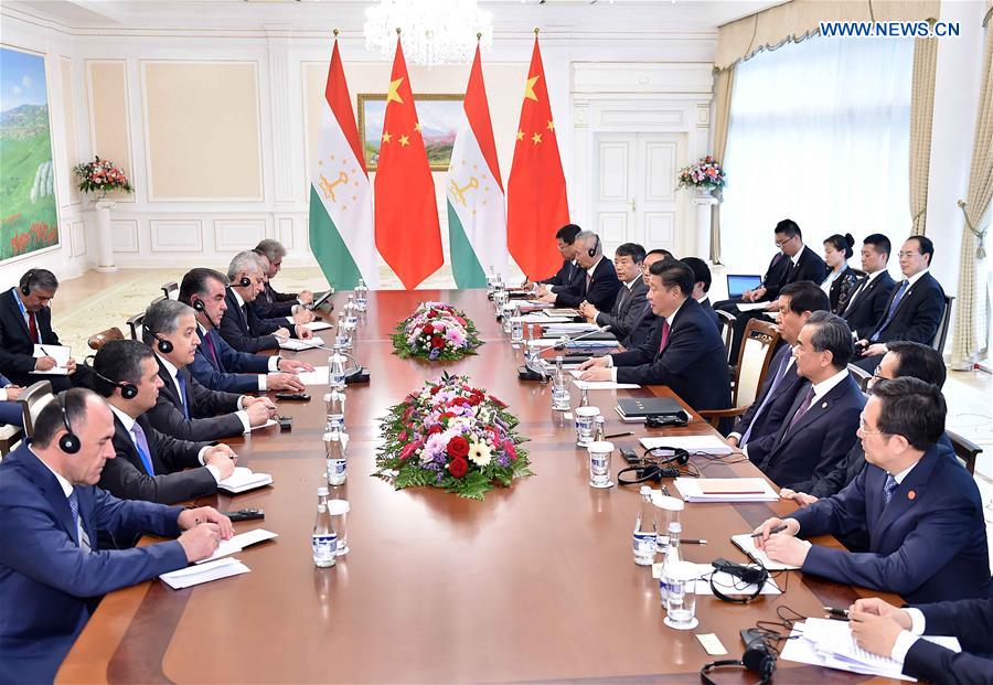 Chinese President Xi Jinping meets with Tajik President Emomali Rahmon in Tashkent, Uzbekistan, June 23, 2016. (Xinhua/Li Tao)