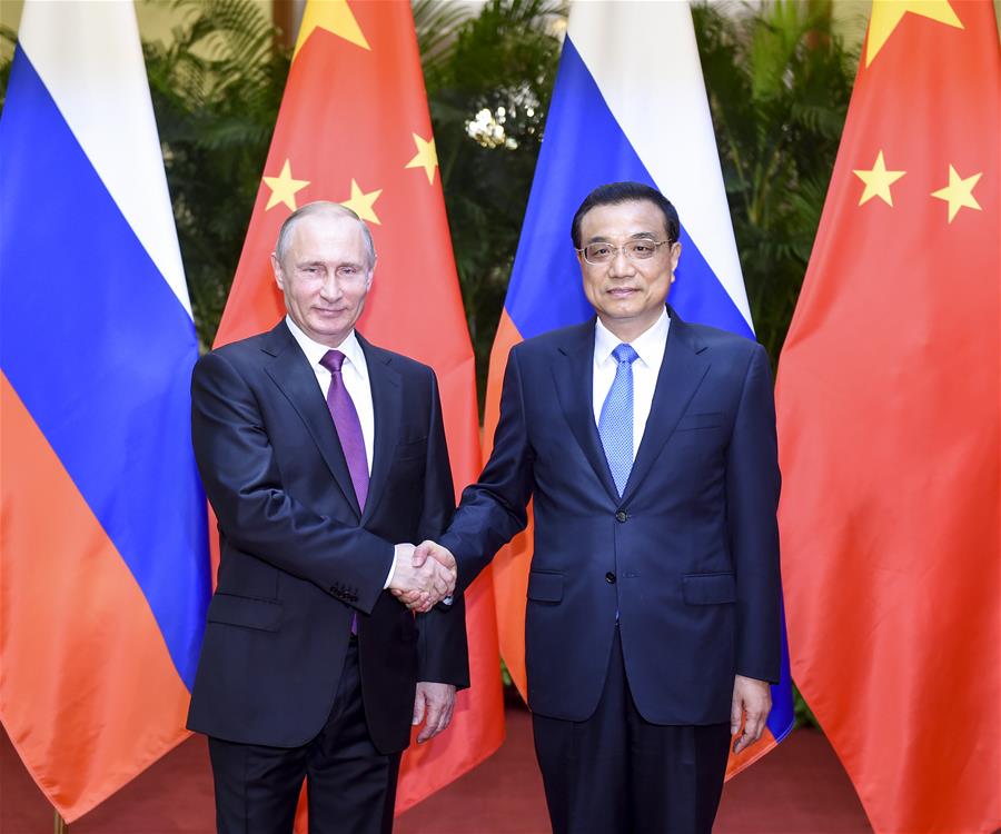 BEIJING, June 25, 2016 (Xinhua) -- Chinese Premier Li Keqiang (R) meets with Russian President Vladimir Putin at the Great Hall of the People in Beijing, capital of China, June 25, 2016. (Xinhua/Li Xueren)