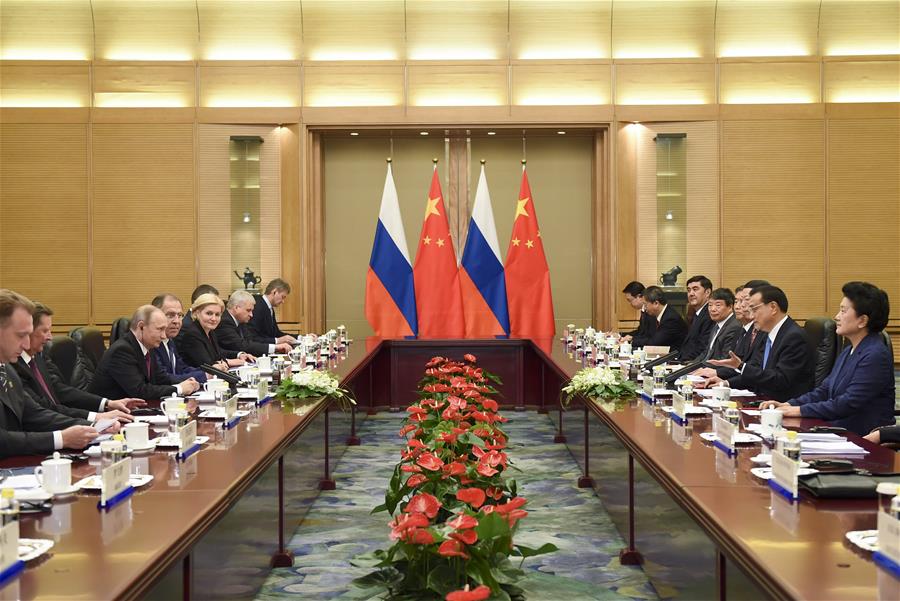 BEIJING, June 25, 2016 (Xinhua) -- Chinese Premier Li Keqiang meets with Russian President Vladimir Putin in Beijing, capital of China, June 25, 2016. (Xinhua/Li Xueren)