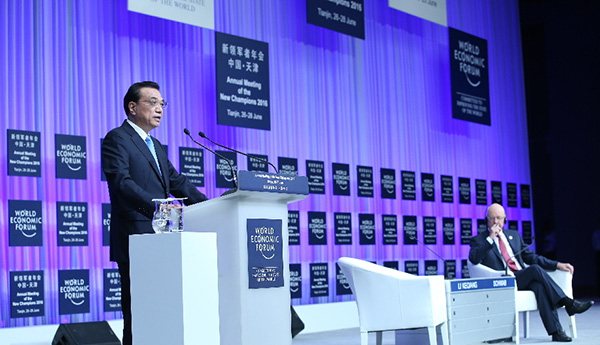 Premier Li Keqiang delivers a keynote speech at the opening of the annual Meeting of the New Champions in Tianjin on June 27, 2016. [Photo / Xinhua]