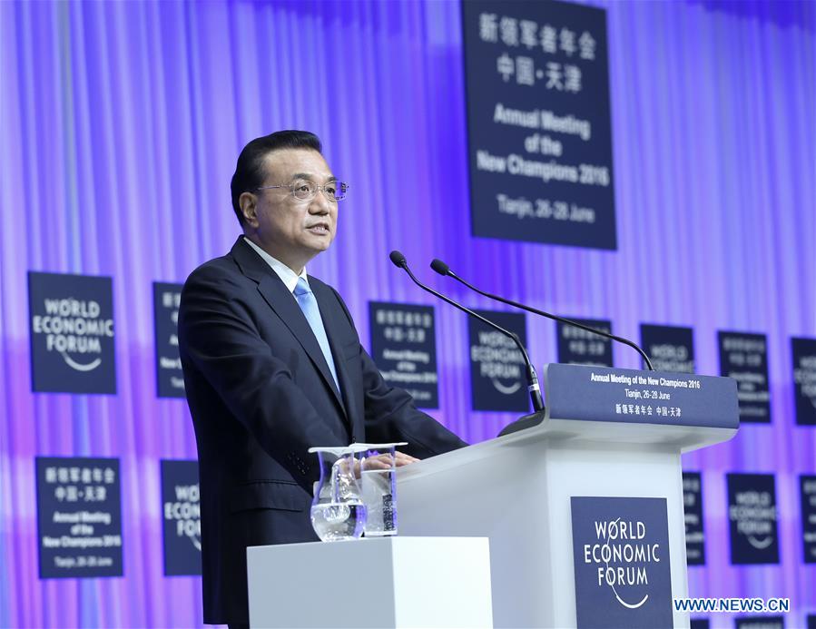 TIANJIN, June 27, 2016 (Xinhua) -- Chinese Premier Li Keqiang addresses the opening ceremony of the Annual Meeting of the New Champions 2016, or Summer Davos Forum, in Tianjin, north China, June 27, 2016. (Xinhua/Pang Xinglei)