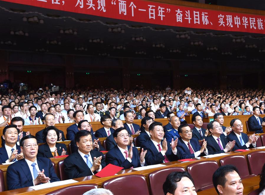  Chinese President Xi Jinping and other senior leaders Li Keqiang, Zhang Dejiang, Yu Zhengsheng, Liu Yunshan, Wang Qishan and Zhang Gaoli join an audience of more than 3,000 at the concert "Eternal Faith" marking the 95th anniversary of the founding of the Communist Party of China at the Great Hall of the People in Beijing, capital of China, June 29, 2016. (Xinhua/Rao Aimin)