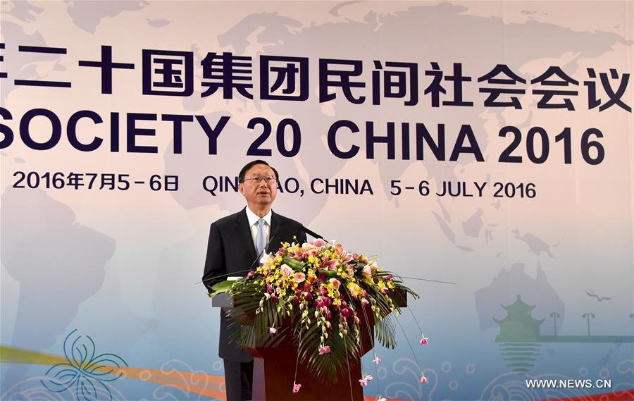 Chinese State Councilor Yang Jiechi reads a congratulatory letter from Chinese President Xi Jinping and addresses the opening ceremony of the Civil Society 20 China 2016 held in Qingdao, east China