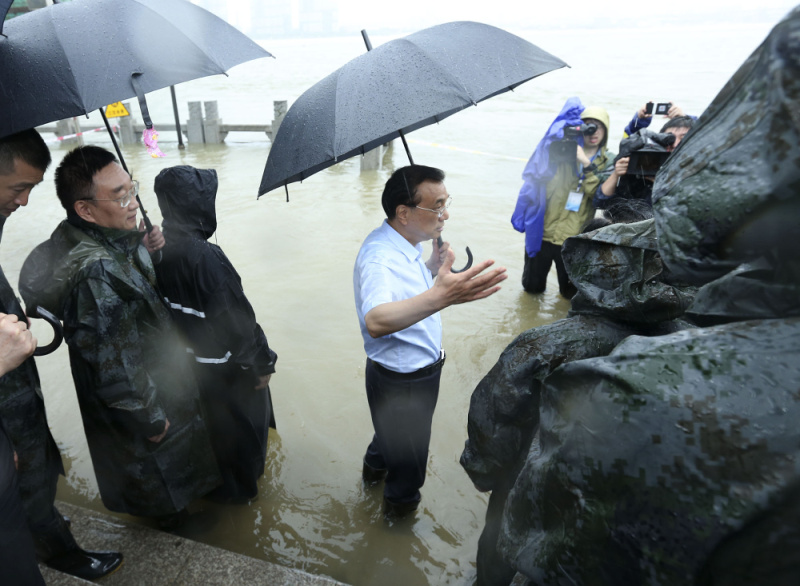 Chinese Premier Li Keqiang joins disaster relief efforts in heavy rain in Wuhan, in central China