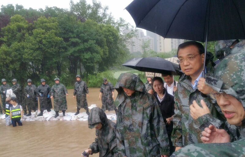 Chinese Premier Li Keqiang joins disaster relief efforts in heavy rain in Wuhan, in central China