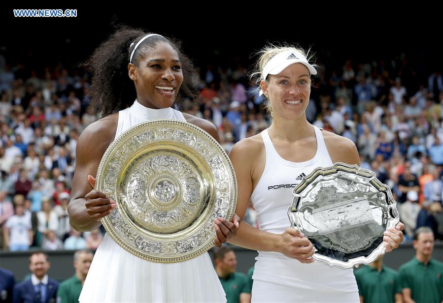 LONDON, July 9, 2016 (Xinhua) -- Serena Williams (L) of the United States and Angelique Kerber of Germany pose with their trophies after the women