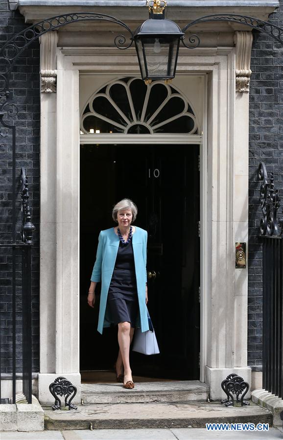 LONDON, July 11, 2016 (Xinhua) -- File photo taken on June 27, 2016 shows British Home Secretary Theresa May leaving after a cabinet meeting at 10 Downing Street in London, Britain. British Home Secretary Theresa May, the only remaining contender in the Tory leadership bid, is to become the new prime minister by Wednesday evening, Prime Minister David Cameron announced Monday. (Xinhua/Han Yan) 