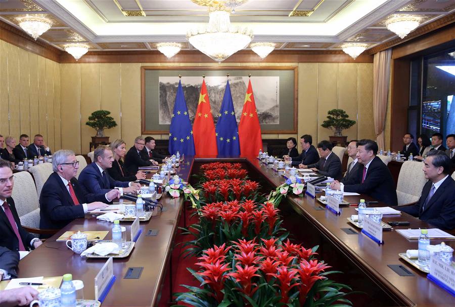 Chinese President Xi Jinping (2nd R, front) meets with European Council President Donald Tusk (3rd L, front) and European Commission President Jean-Claude Juncker (2nd L, front) in Beijing, capital of China, July 12, 2016. 