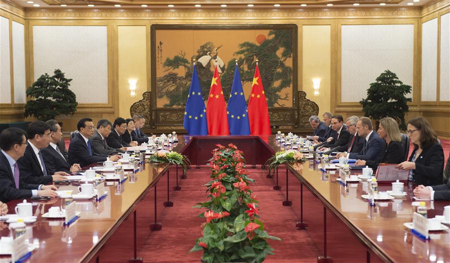 Chinese Premier Li Keqiang (4th L) meets with European Council President Donald Tusk (3rd R) and European Commission President Jean-Claude Juncker (4th R) in Beijing, capital of China, July 12, 2016. Premier Li Keqiang co-chaired the 18th China-EU summit with the two EU leaders here on Tuesday. 
