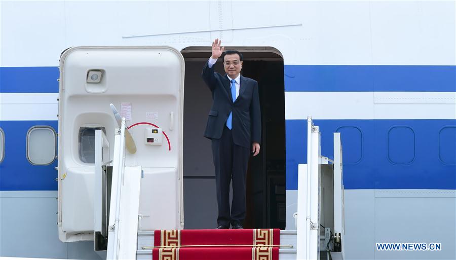 ULAN BATOR, July 13, 2016 (Xinhua) -- Chinese Premier Li Keqiang arrives at Ulan Bator, Mongolia, July 13, 2016. Li arrived here Wednesday for an official visit to Mongolia and the 11th Asia-Europe Meeting (ASEM) summit. (Xinhua/Zhang Duo)