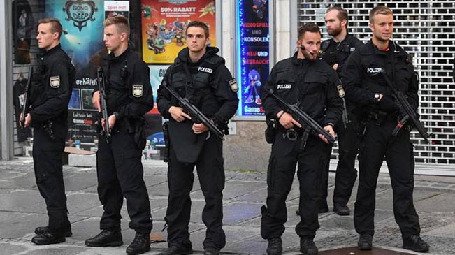 The Munich police say at least ten people are killed, including one possible suspect in a shooting rampage at a shopping center.
