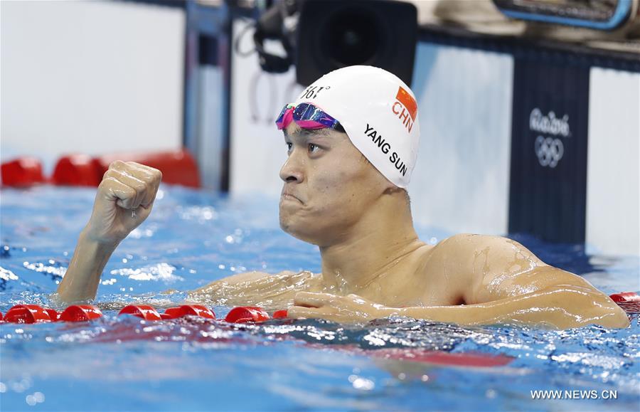 Sun Yang of China celebrates after the men