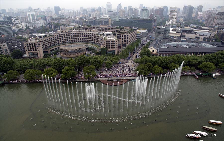 File photo taken on May 24, 2016 shows a music fountain in West Lake in Hangzhou, east China